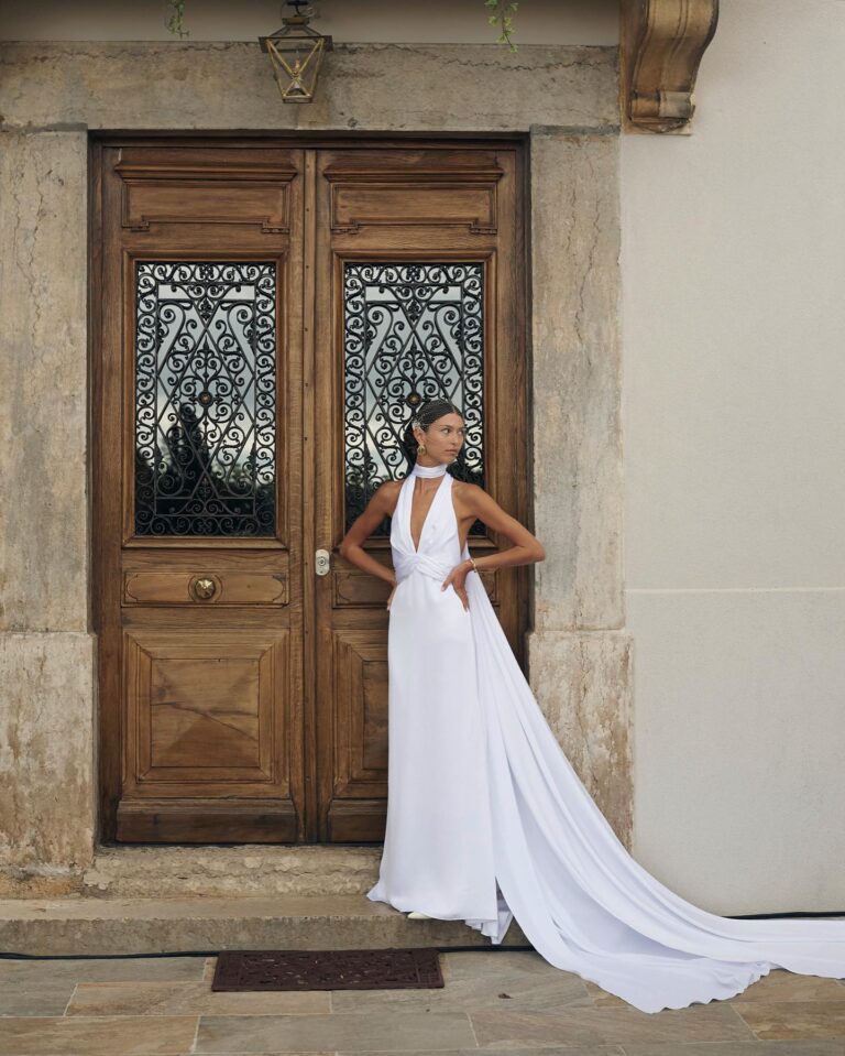 Alt text: Bride in sleek ivory slip dress at civil ceremony, minimalist silhouette, simple elegant bridal look