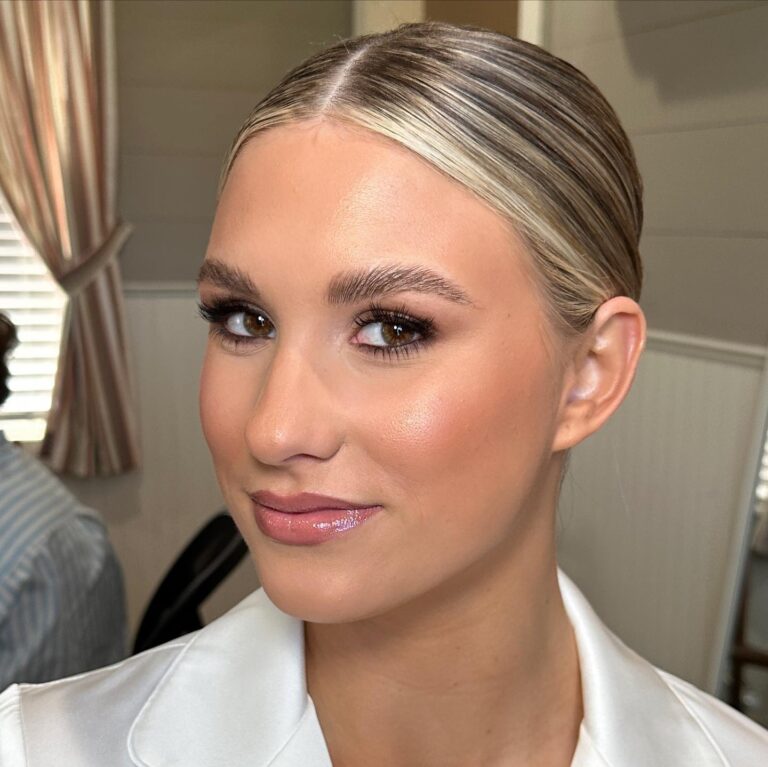 Bride with softly defined natural brows, light pencil and clear brow gel, ethereal bridal makeup