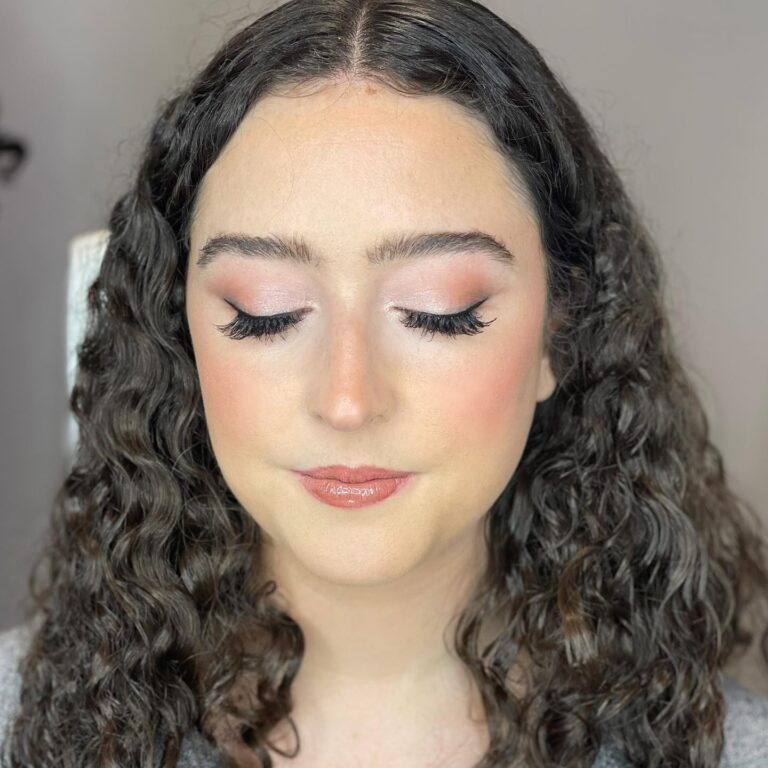 Alt text: Bride with fresh-faced glow, dewy natural skin, no foundation, soft hydrated complexion, natural light portrait