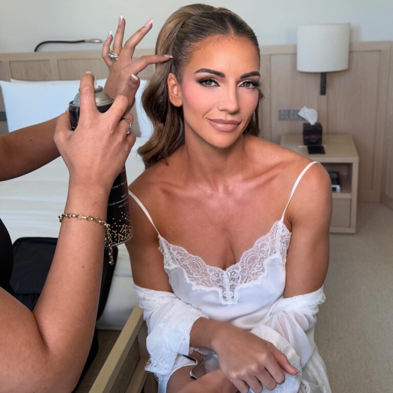 Alt text: Bride with lightly flushed peach-toned cheeks, just-in-from-the-sun natural look, no-makeup bridal close-up