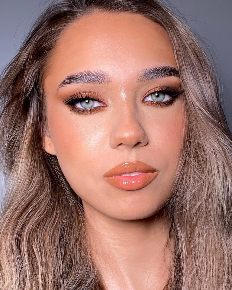 Alt text: Bride with hydrated soft natural lips, nourishing balm only, completely bare minimal bridal lip look