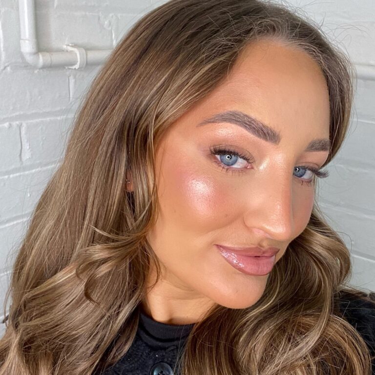 Alt text: Bride with sheer glowy SPF base, sun-protected radiant skin, outdoor no-makeup bridal look